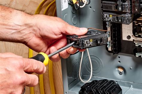 how to change an electrical breaker box|removing circuit breaker from panel.